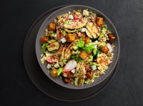 Plated bowl of steamed quinoa and vegetables